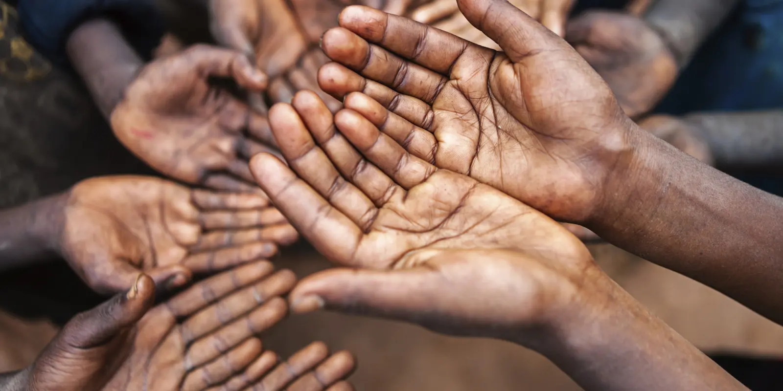A group of outstretched hands